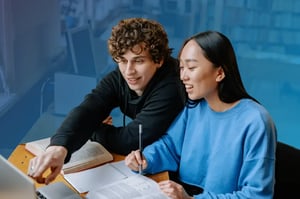 Students working on college application