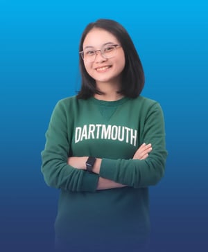 A female student wearing a Dartmouth sweatshirt