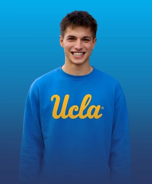 A male student wearing a UCLA sweatshirt