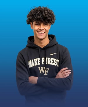 A male student wearing a Wake Forest sweatshirt